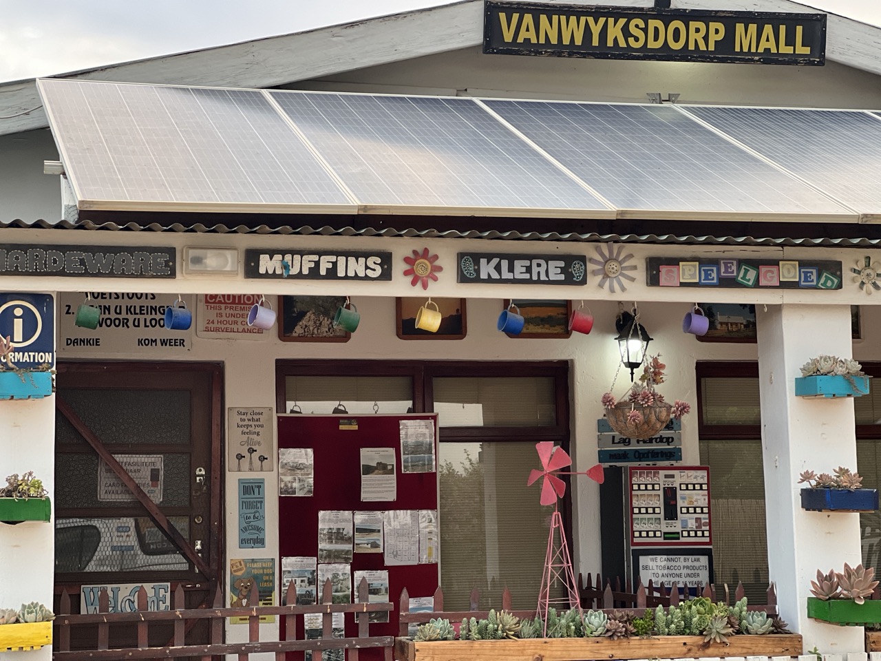 A hand-painted general store and coffee shop in a small Klein Karoo village